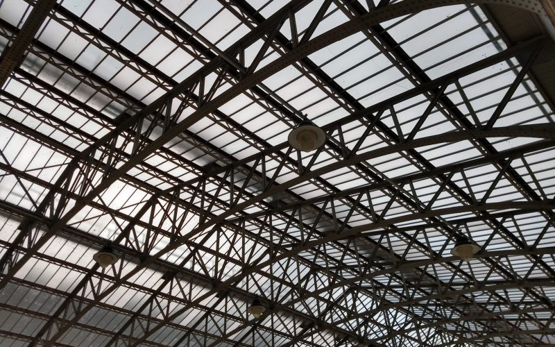 low-angle-view-train-station-skylight-with-complex-pattern-metal-supports